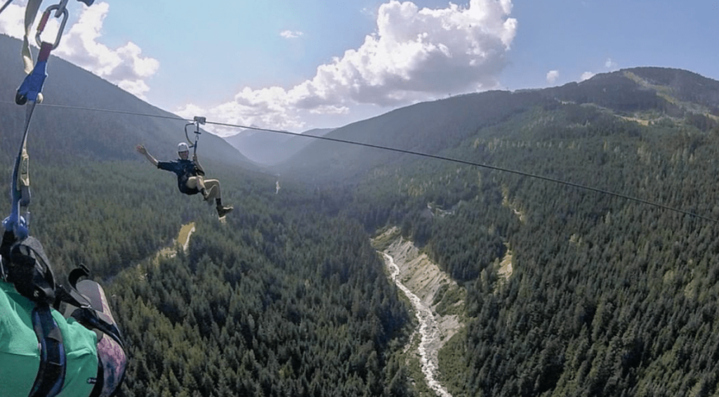 man zip lining