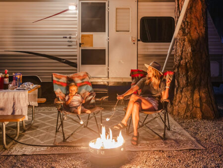mom and child with camper