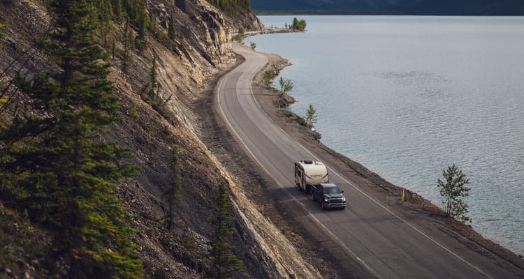 Driving on highway next to water
