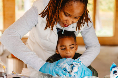 Jamar McNeil's wife and son making bannock