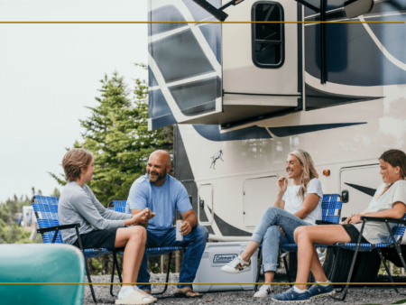 Bryan Baeumler and his family sitting outside of their RV