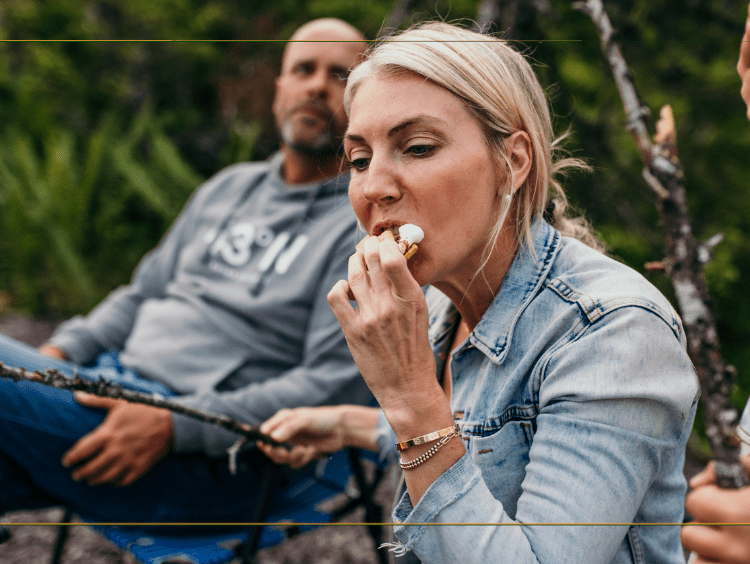 Sarah Baeumler eating a s'more
