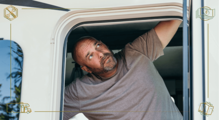 Bryan Baeumler looking outside the door of his RV