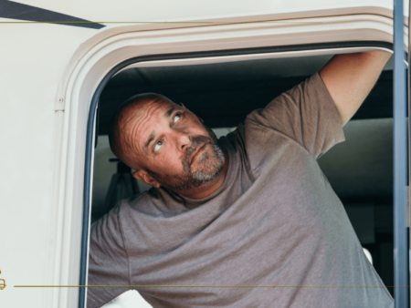 Bryan Baeumler looking outside the door of his RV