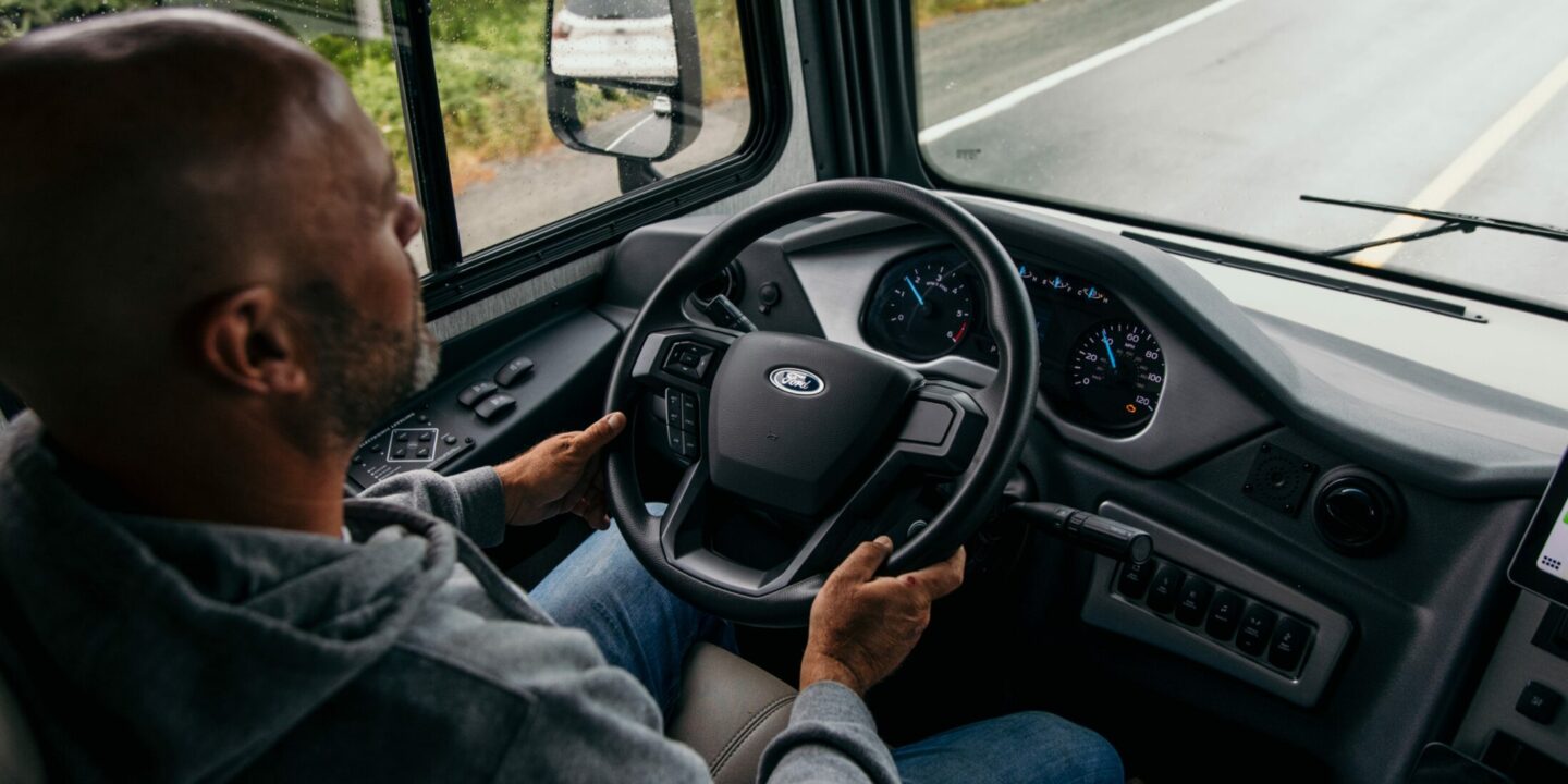 Bryan Baeumler behind the wheel and driving his class A motorhome