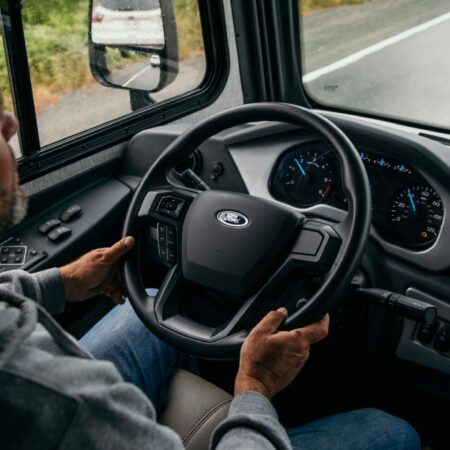 Bryan Baeumler behind the wheel and driving his class A motorhome