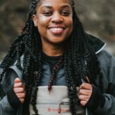 Headshot of Demiesha Dennis, founder and director of Brown Girl Outdoor World