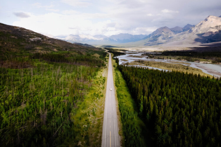 Road to Abraham Lake with a class B campervan driving down the middle